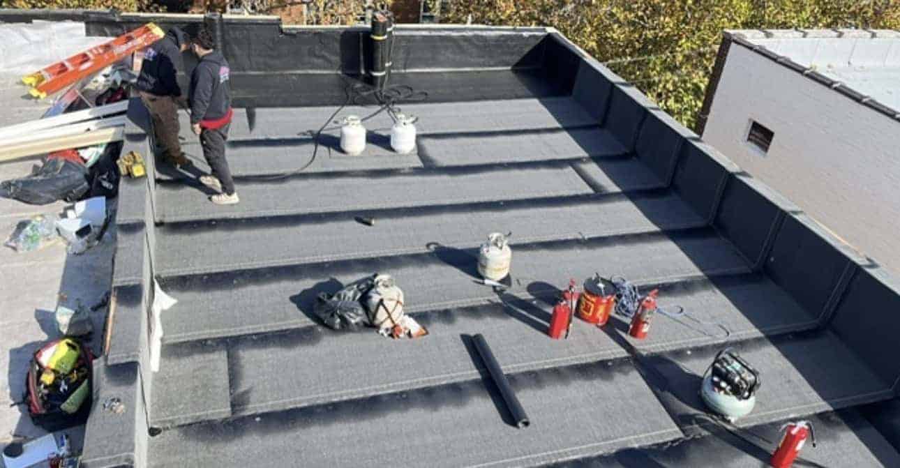 Flat roof with NYC skyline view across the Hudson in Weehawken, NJ — Gaby Roofing NJ