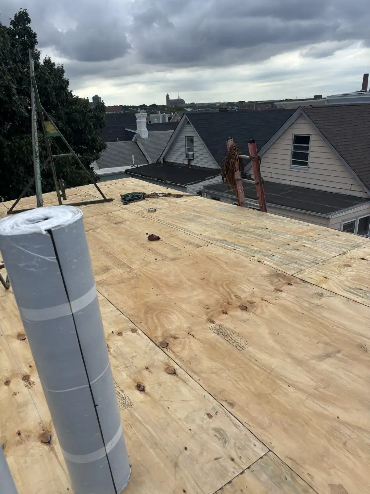Tear-off complete with new plywood roof deck installed on a multi-family flat roof in Harrison NJ